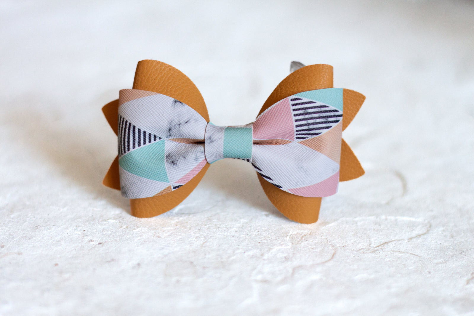 Tan and Pink Geometric Bow Tie